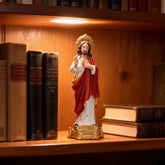 1-sacred heart of jesus statue on book shelf