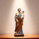 1-saint joseph statue with baby jesus under holy light