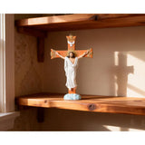 2-risen christ cruficix with holy spirit dove on wooden shelf with sunshine