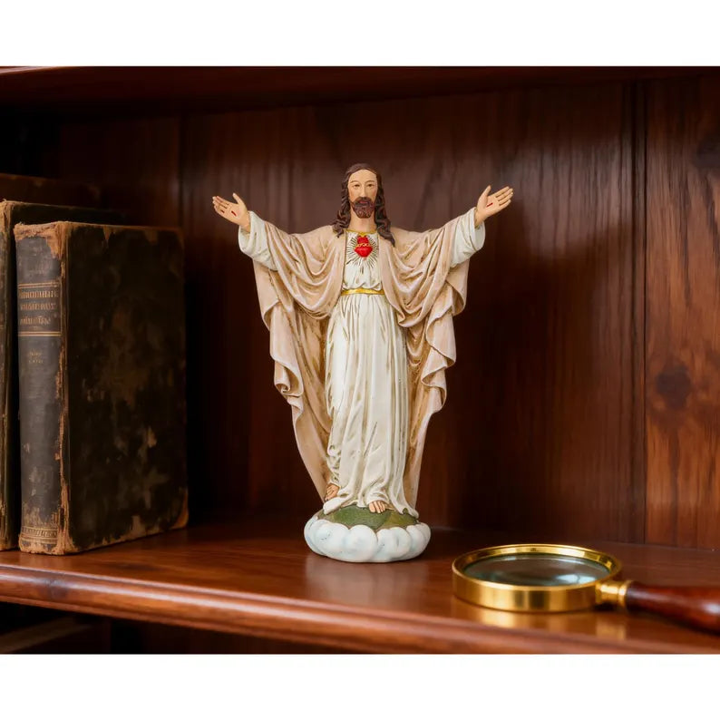 11-handmade sacred heart of jesus statue on wooden book shelf