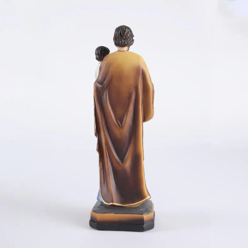 11-saint joseph statue with baby jesus plain background
