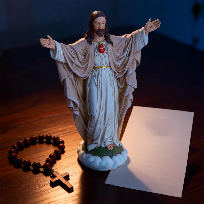 7-handmade sacred heart of jesus statue on wooden table dark atmosphere 2